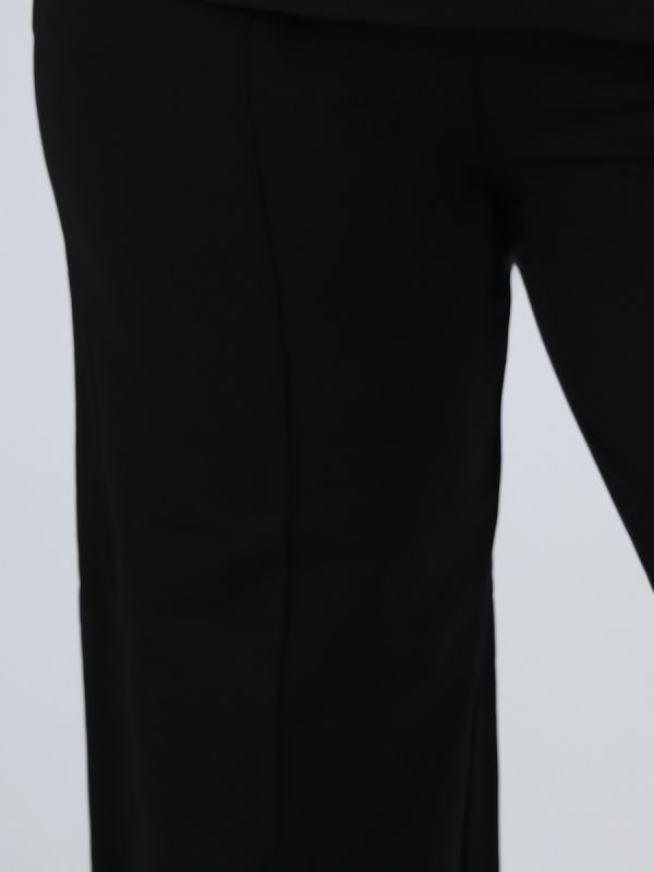 Women's tracksuit with black trousers and white sweatshirt